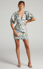 Amalie The Label - Indrisia Linen Puff Sleeve Open Back Bodycon Mini Linen Dress in Iris Floral